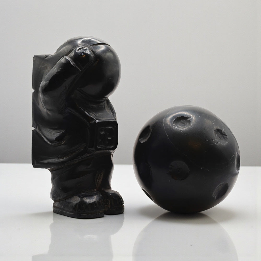 Astronaut with marble moon