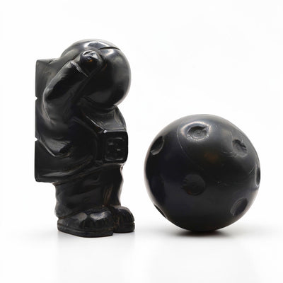 Astronaut with marble moon