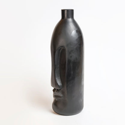 Large bottle with marble face.