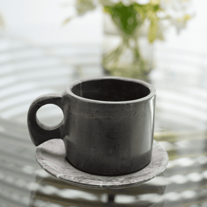 Black cup with marble plate