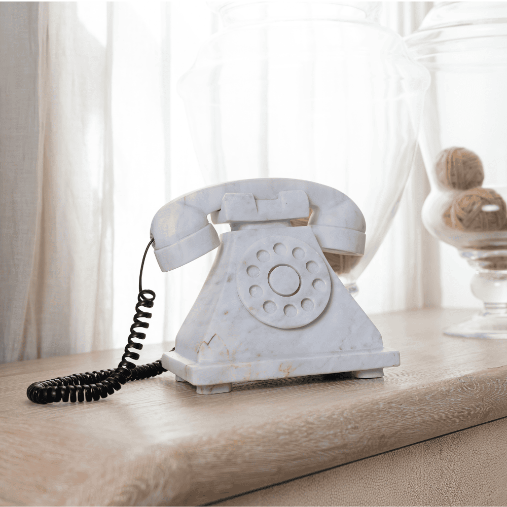 Antique white marble telephone.