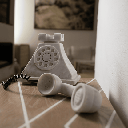 Antique white marble telephone.