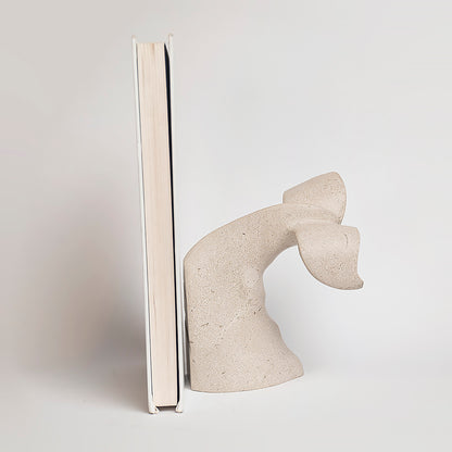 Marble whale bookholder.