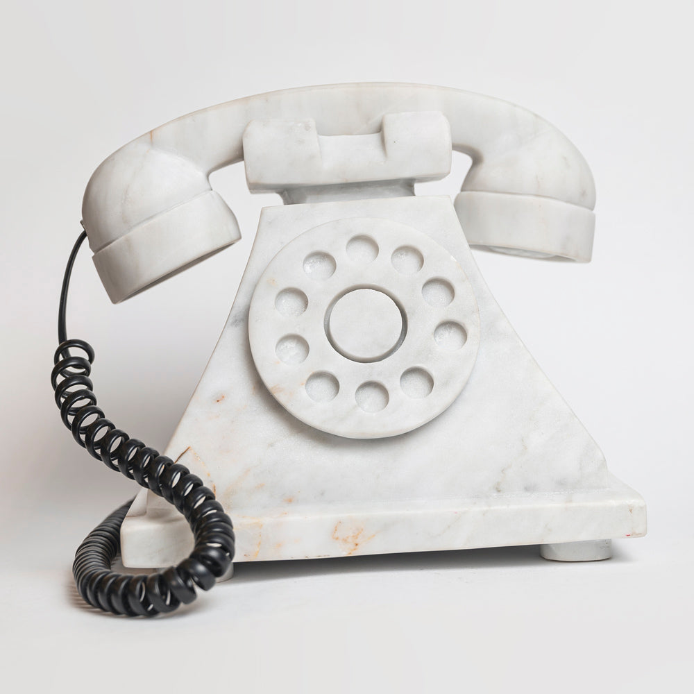 Antique white marble telephone.