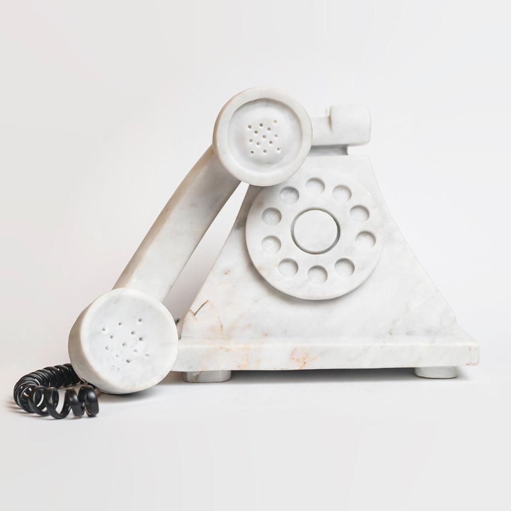 Antique white marble telephone.