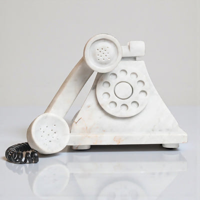 Antique white marble telephone.