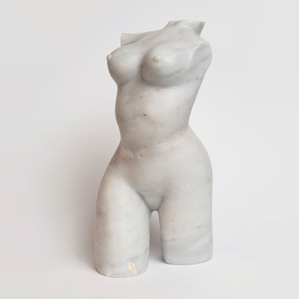 Marble female torso.