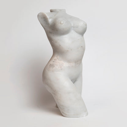 Marble female torso.