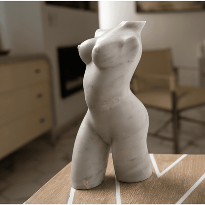 Marble female torso.